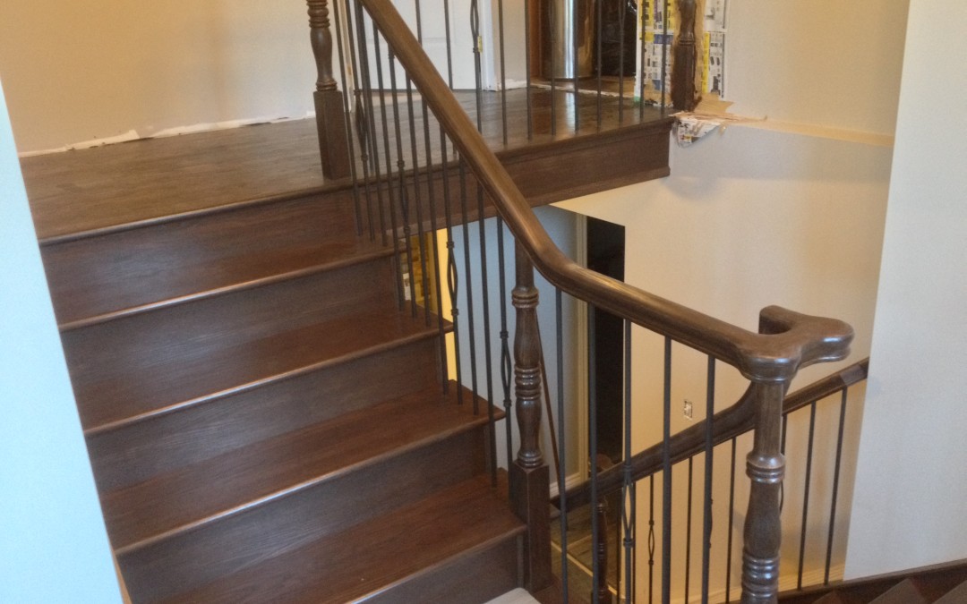 Refinished oak with new wrought iron spindles